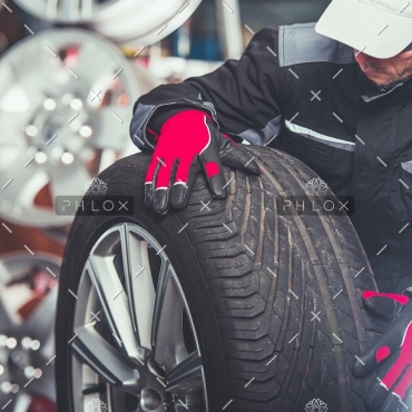 demo-attachment-241-replacing-car-tires-F6SZJYW